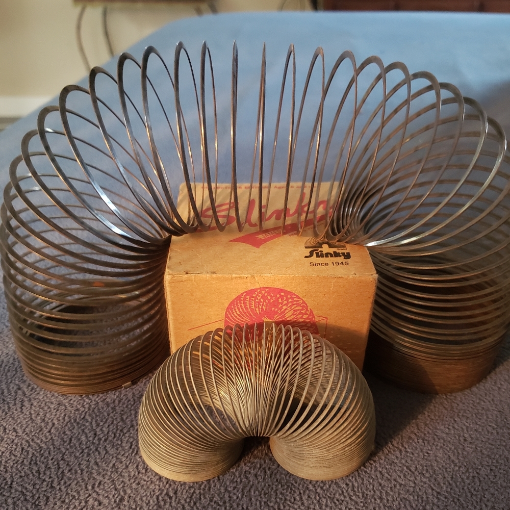 1945 Vintage Slinky with baby
